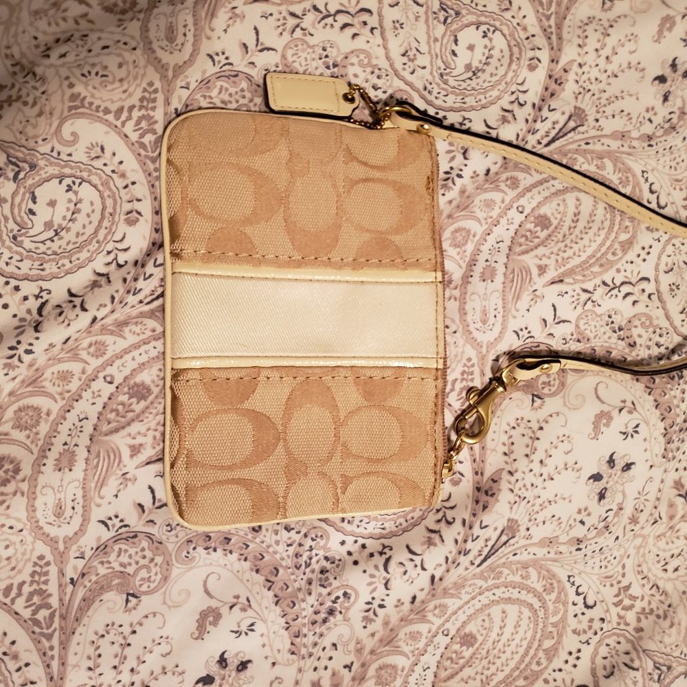 Gold coach wristlet